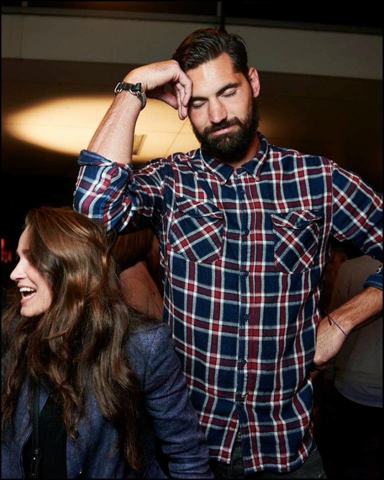 Luke Stone in a plaid shirt, editorial portrait